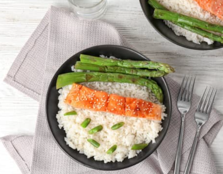 Brown rice with saffron, peas, salmon and asparagus
