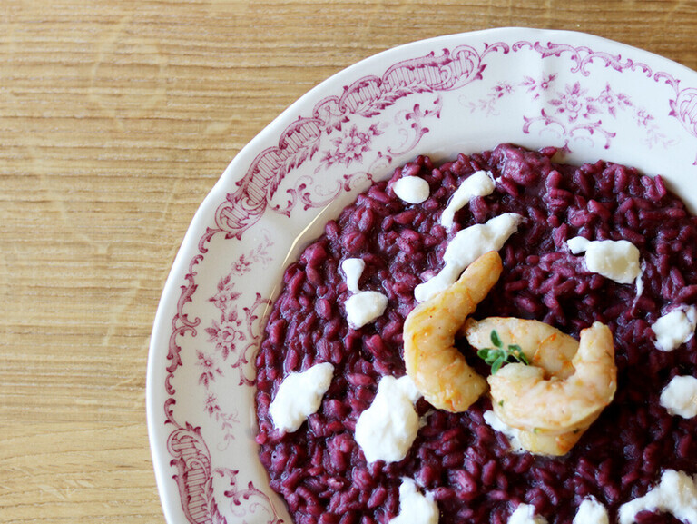Risotto with wild berries, stracciatella and shrimps cooked at low temperature