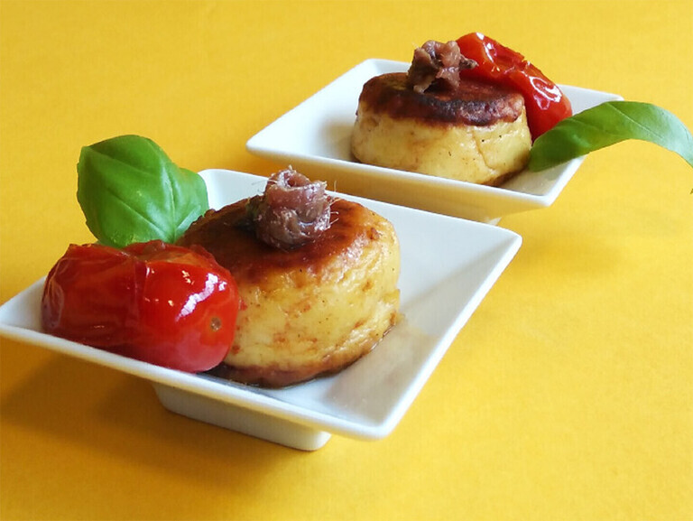 Ricotta balls with cherry tomatoes and basil
